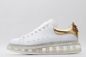 ALEXANDER MCQUEEN oversized sneakers with gold heel