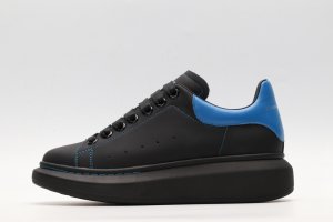 ALEXANDER MCQUEEN black oversized sneakers with blue heel