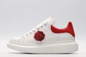 ALEXANDER MCQUEEN oversized sneakers with red heel