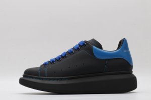 ALEXANDER MCQUEEN black oversized sneakers with blue heel