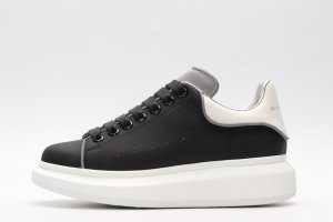 ALEXANDER MCQUEEN black oversized sneakers with silver heel