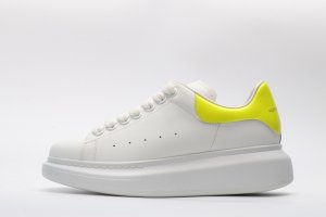 ALEXANDER MCQUEEN yellow foil embellished chunky leather sneakers