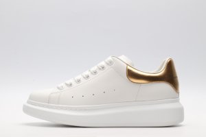 ALEXANDER MCQUEEN OVERSIZED SNEAKER with gold grain leather heel