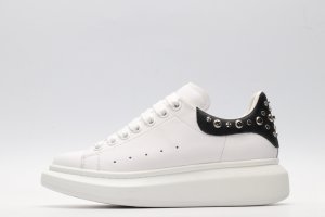 White calf leather lace-up sneaker trimmed with contrasting-color black calf leather heel