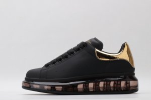 ALEXANDER MCQUEEN oversized sneakers black with gold heel
